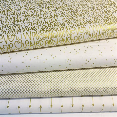 quilt fabric with metallic gold|white fabric with gold accents.